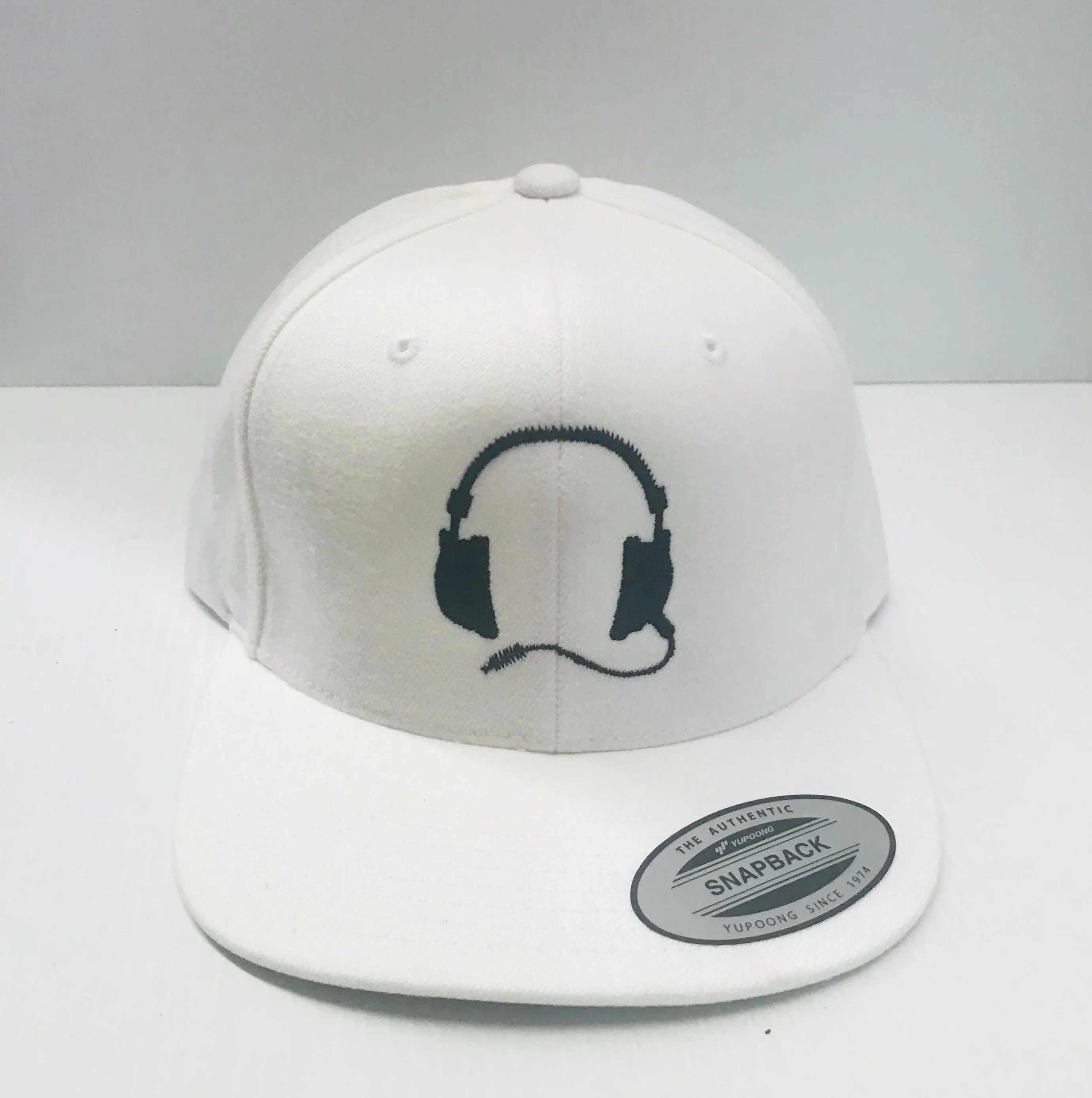 White cap / black logo